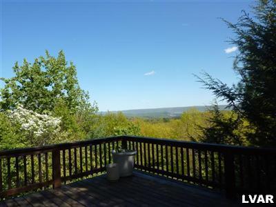 6379 Five Springs Road Shavertown, PA 18708 - Photo 2 of 35 a view of balcony with wooden floor and fence