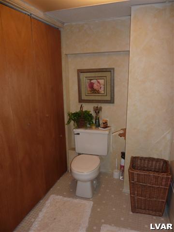 6379 Five Springs Road Shavertown, PA 18708 - Photo 22 of 35 a toilet sitting in a bathroom next to a sink