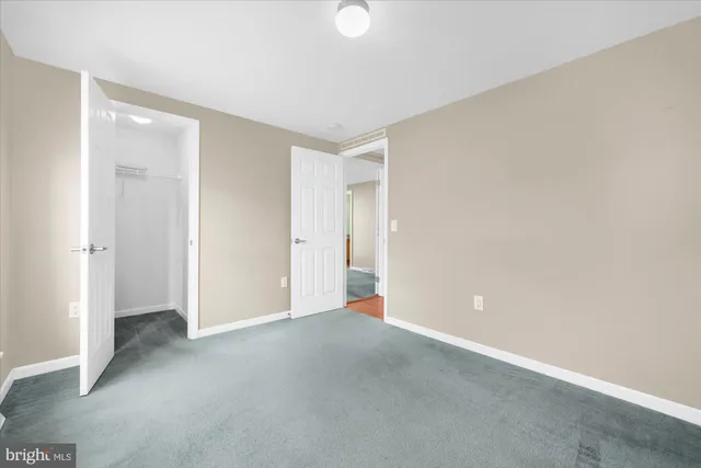 a view of an empty room and window