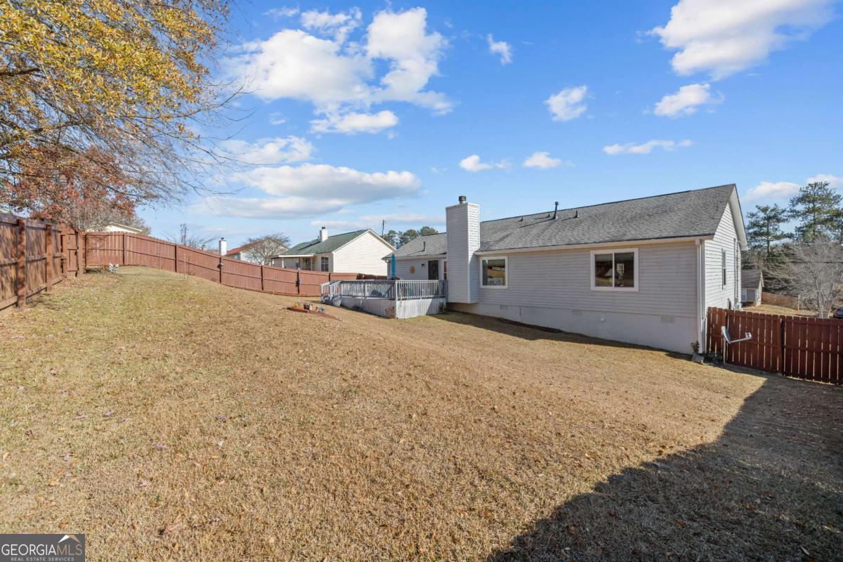 6324 Amberly Road Rex, GA 30273 - Photo 6 of 22 a view of backyard of a house