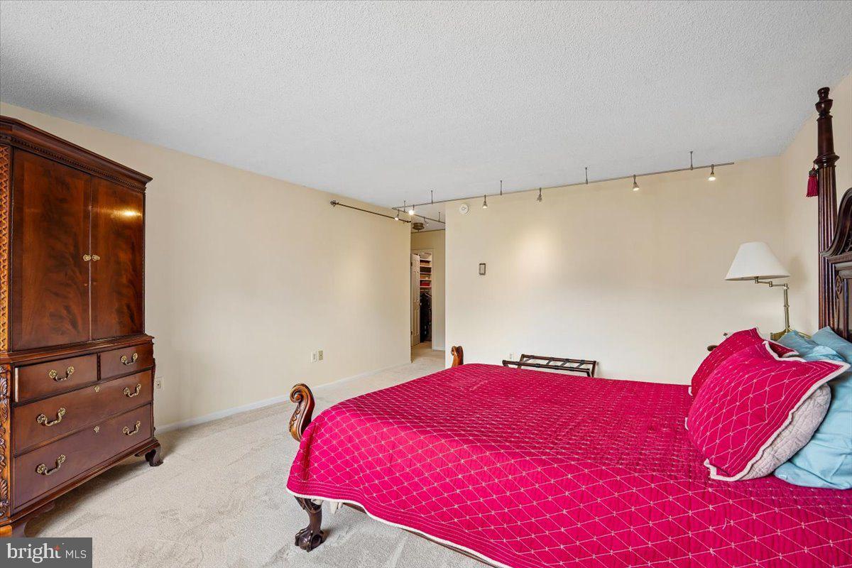 800 25th Street Northwest, Unit 504 Washington, DC 20037 - Photo 35 of 52 Spacious bedroom with elegant charm.
