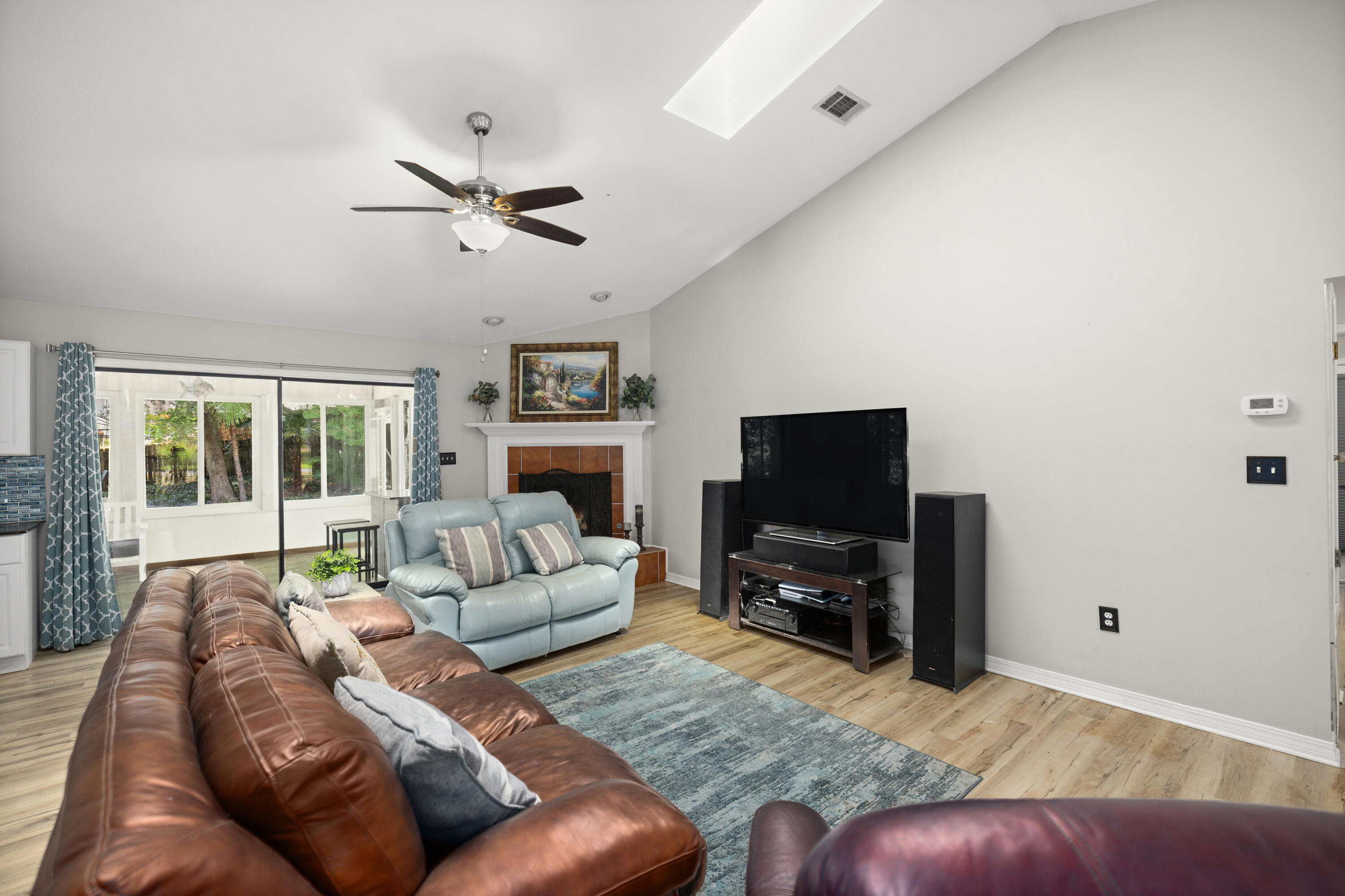 314 Ruckel Drive Niceville, FL 32578 - Photo 14 of 66 a living room with furniture and a flat screen tv