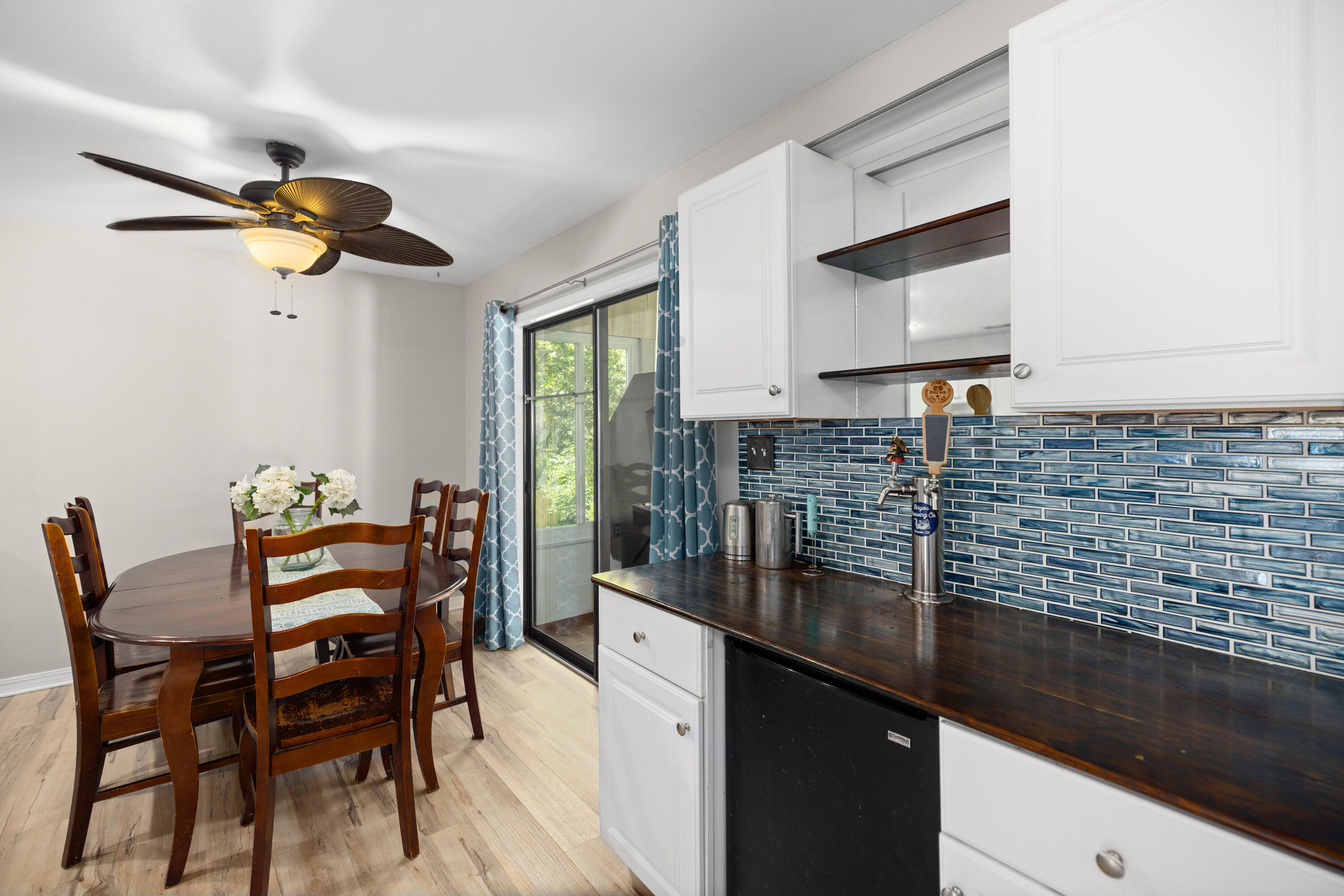 314 Ruckel Drive Niceville, FL 32578 - Photo 24 of 66 a kitchen with a sink cabinets and window