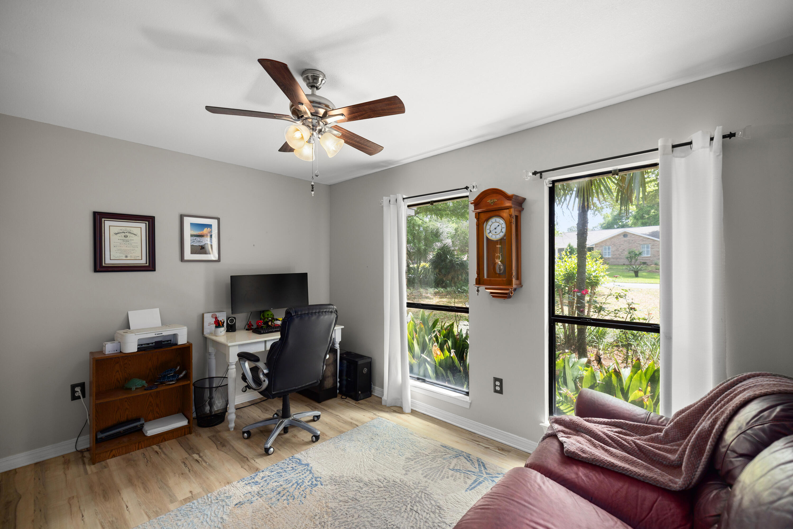 314 Ruckel Drive Niceville, FL 32578 - Photo 28 of 66 a living room with furniture and a window
