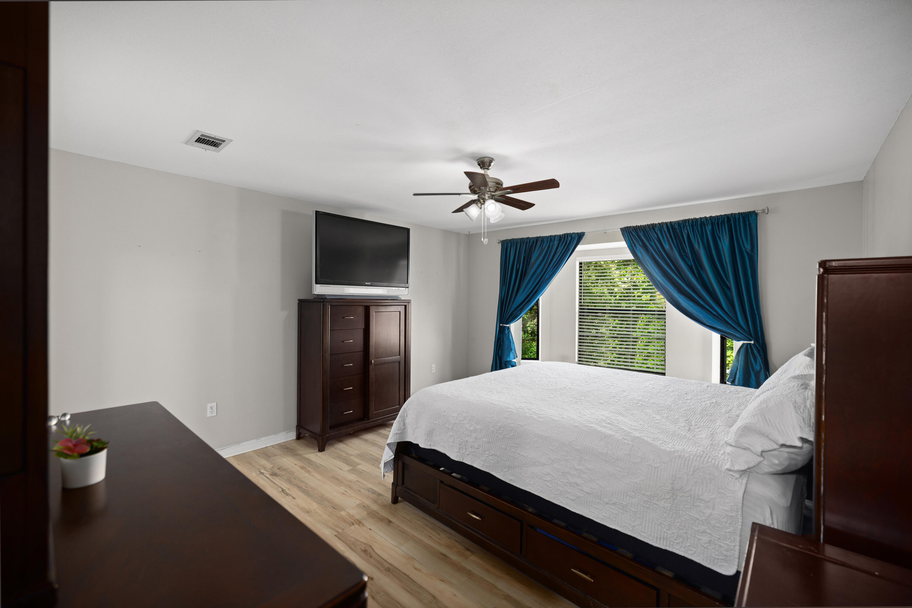 314 Ruckel Drive Niceville, FL 32578 - Photo 29 of 66 a bedroom with a bed and a flat screen tv