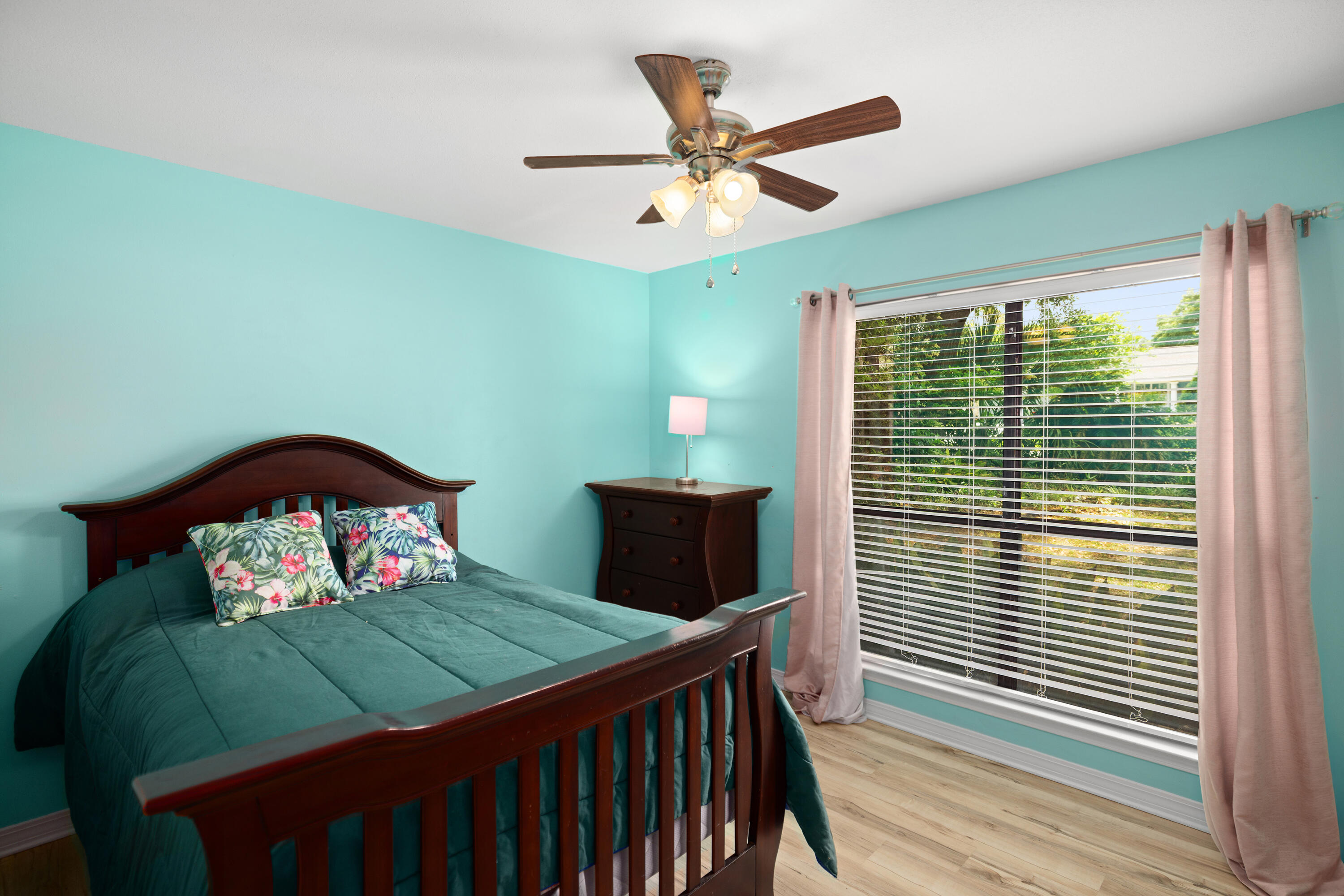 314 Ruckel Drive Niceville, FL 32578 - Photo 42 of 66 a bedroom with a bed and a large window