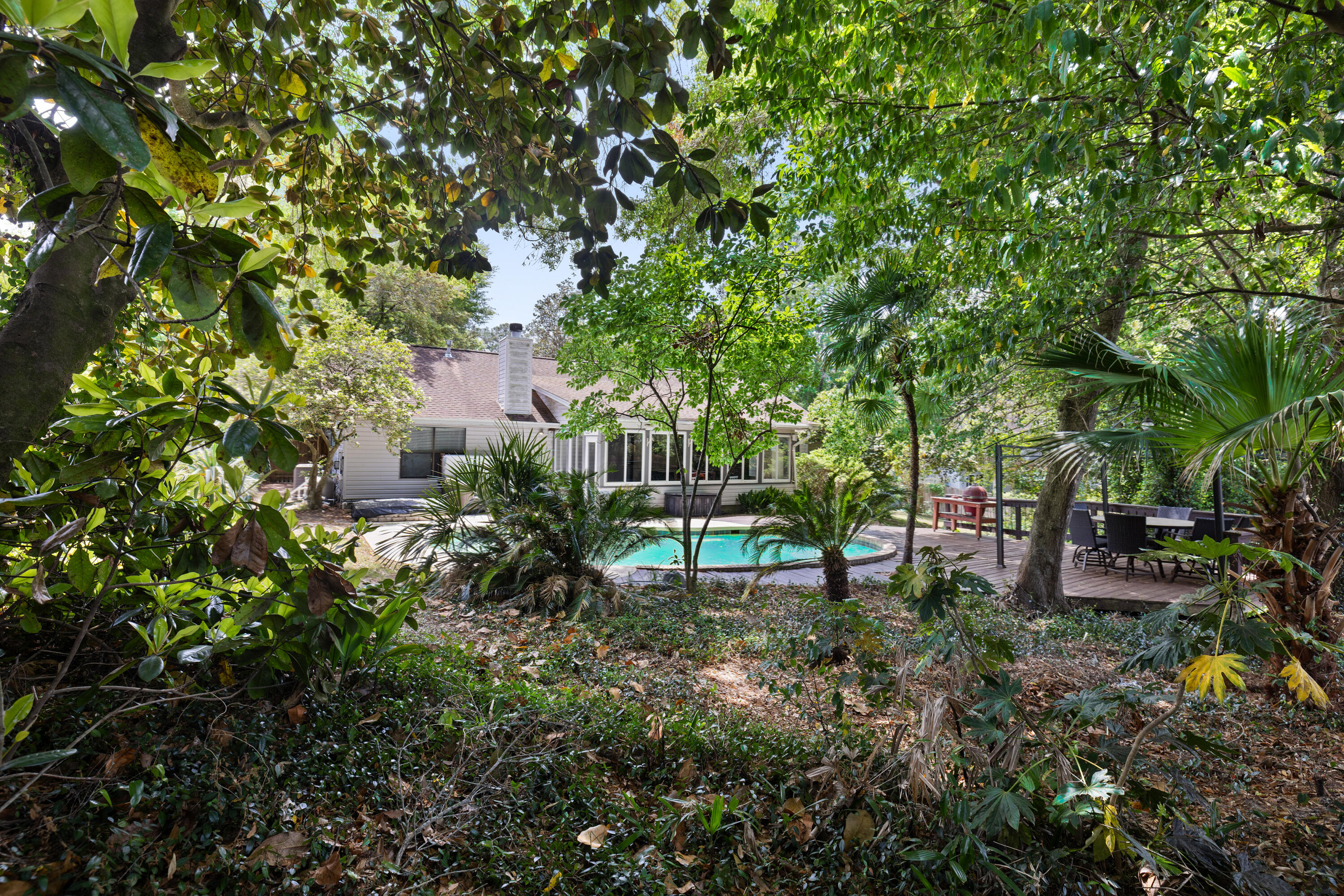 314 Ruckel Drive Niceville, FL 32578 - Photo 60 of 66 a view of a bench in a garden