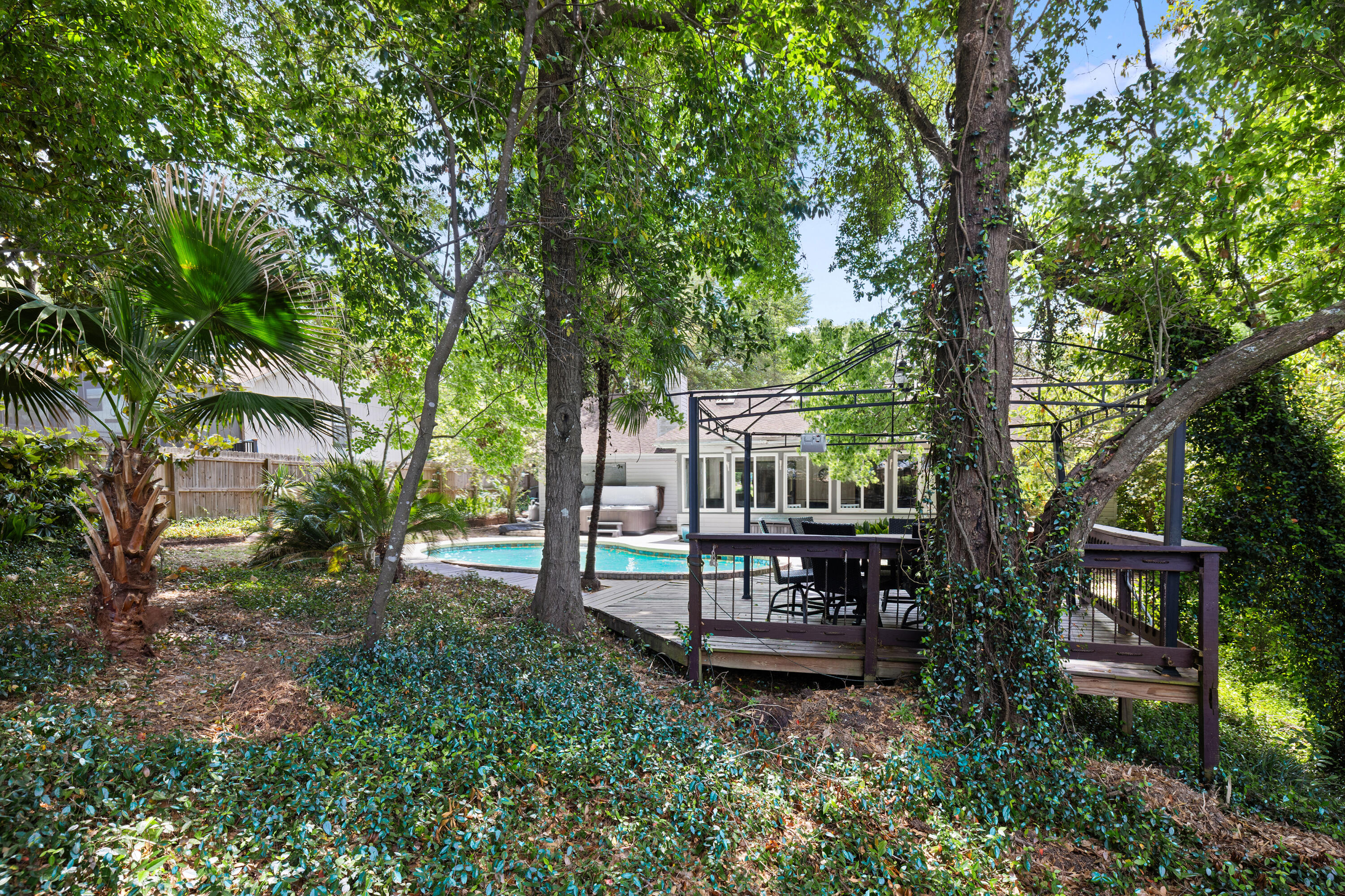 314 Ruckel Drive Niceville, FL 32578 - Photo 61 of 66 a view of a bench in the garden