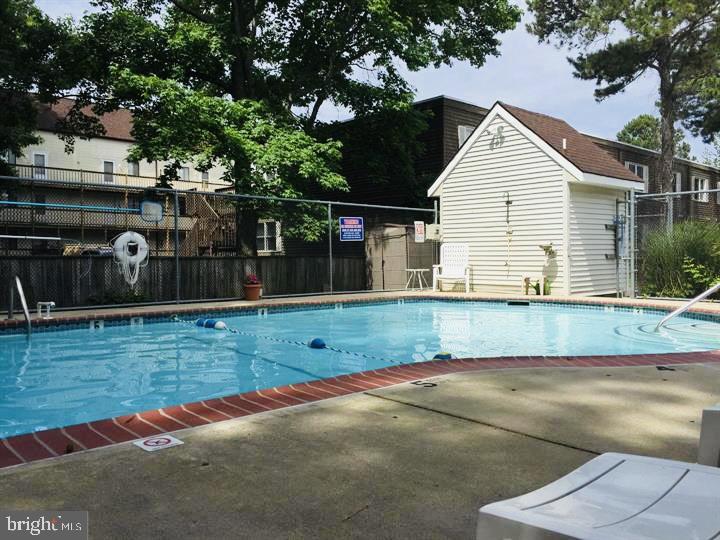 14400 Jarvis Avenue, Unit 113C Ocean City, MD 21842 - Photo 19 of 19 a view of backyard with green space