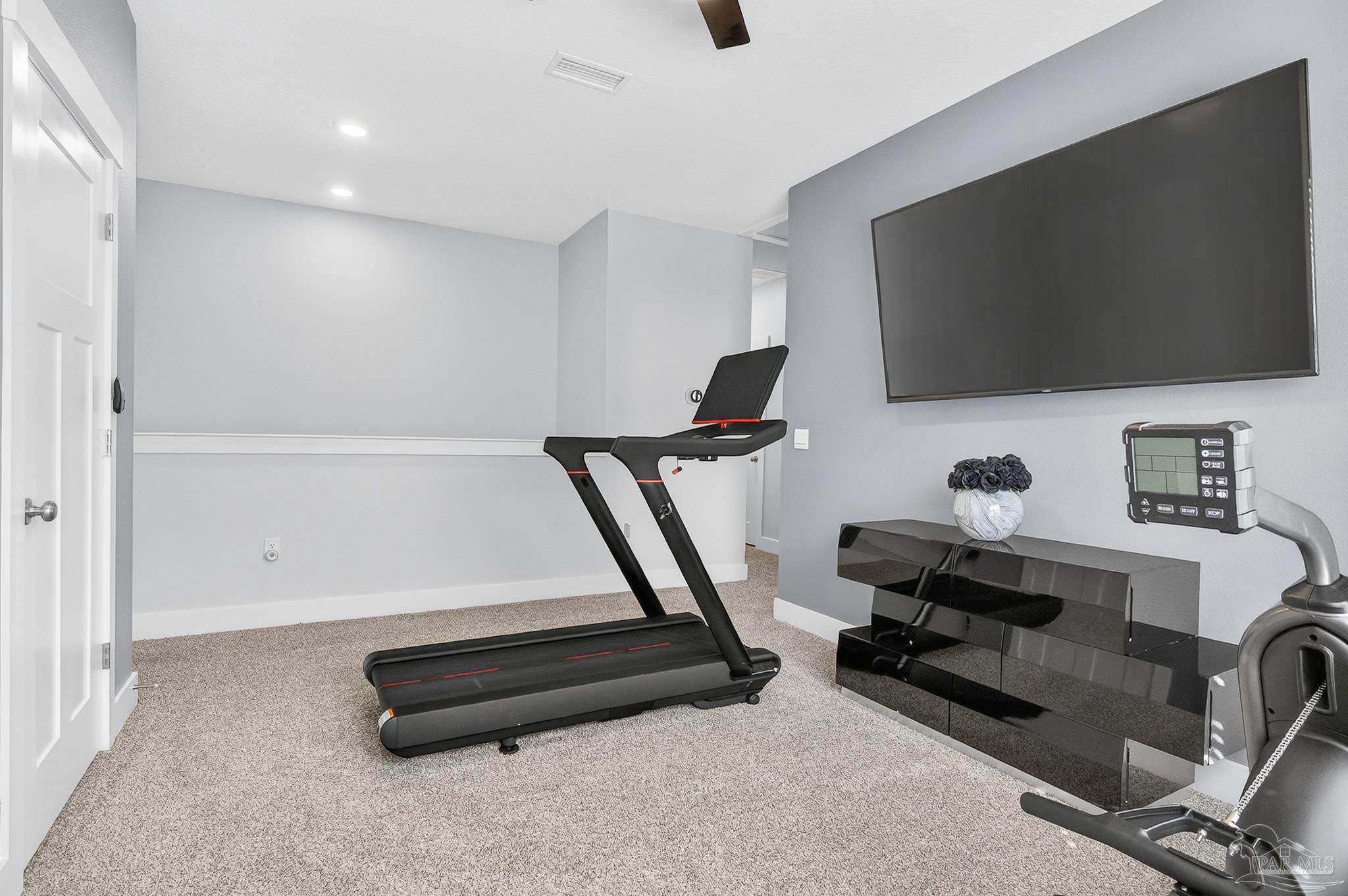 6076 Rutherford Loop Pensacola, FL 32526 - Photo 41 of 67 a living room with furniture and a flat screen tv