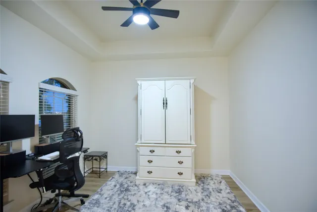 a view of a workspace with furniture