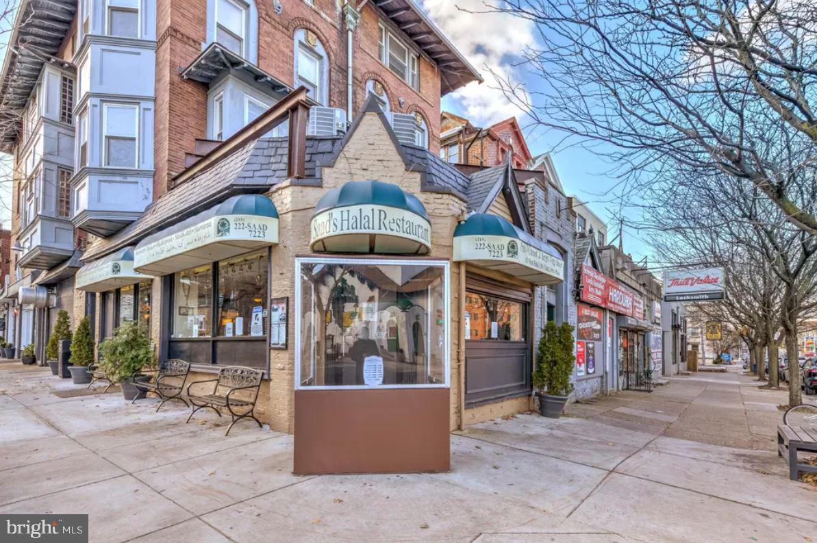 4508 Walnut Street, Unit 302 Philadelphia, PA 19139 - Photo 13 of 14 a view of a building with sitting area