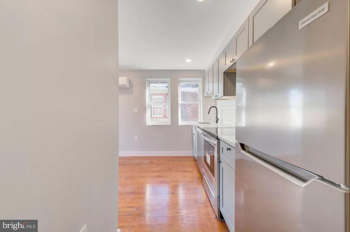4508 Walnut Street, Unit 302 Philadelphia, PA 19139 - Photo 8 of 14 a view of hallway with stairs