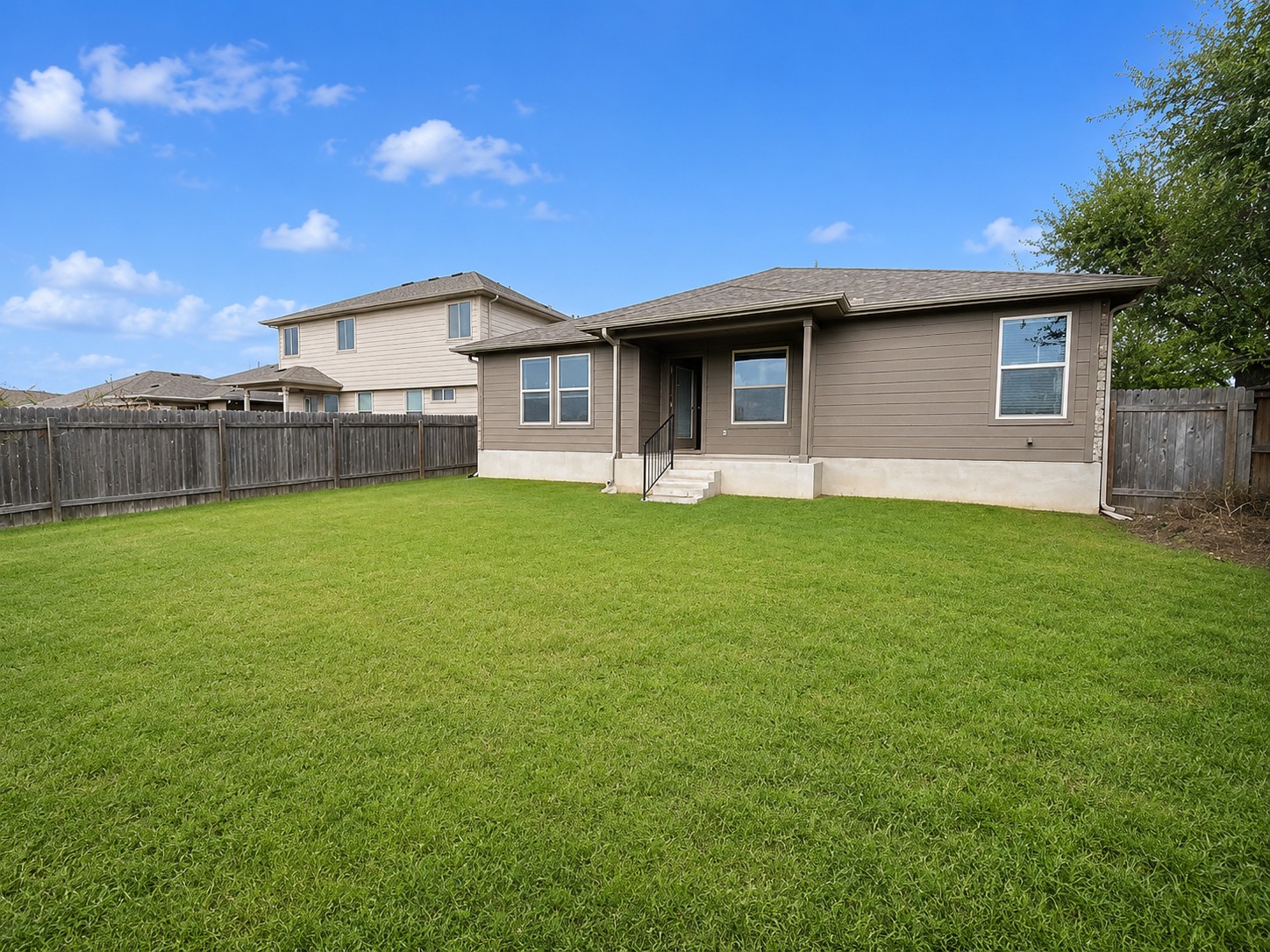 228 Avalanche Avenue Georgetown, TX 78626 - Photo 15 of 16 a front view of a house with a yard and garage