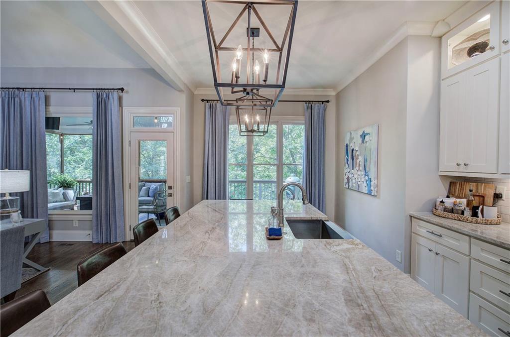 16 Cambridge Way Cartersville, GA 30121 - Photo 13 of 48 a very nice looking room with a large window and chandelier