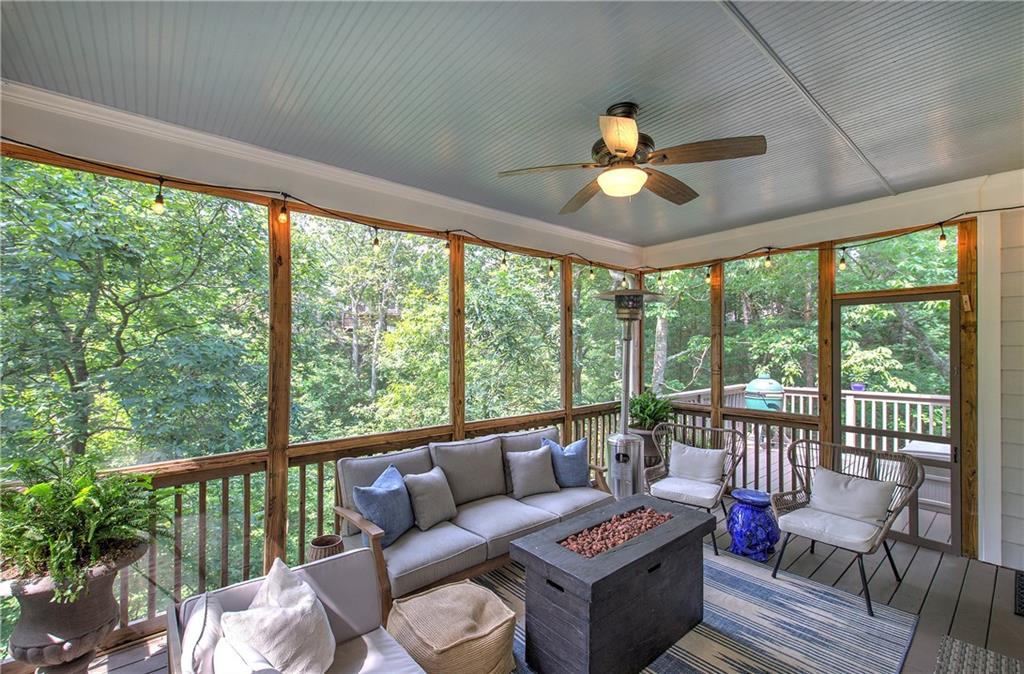 16 Cambridge Way Cartersville, GA 30121 - Photo 16 of 48 a living room with furniture and a floor to ceiling window