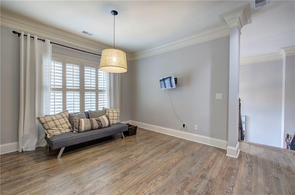 16 Cambridge Way Cartersville, GA 30121 - Photo 27 of 48 a living room with furniture and a window