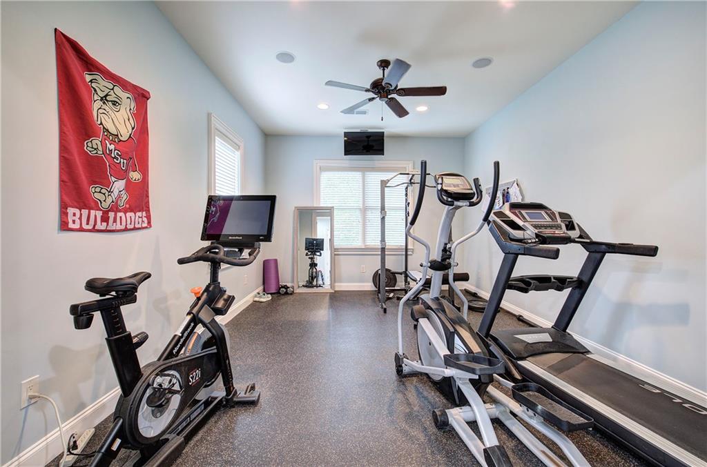 16 Cambridge Way Cartersville, GA 30121 - Photo 37 of 48 a view of a room with gym equipment
