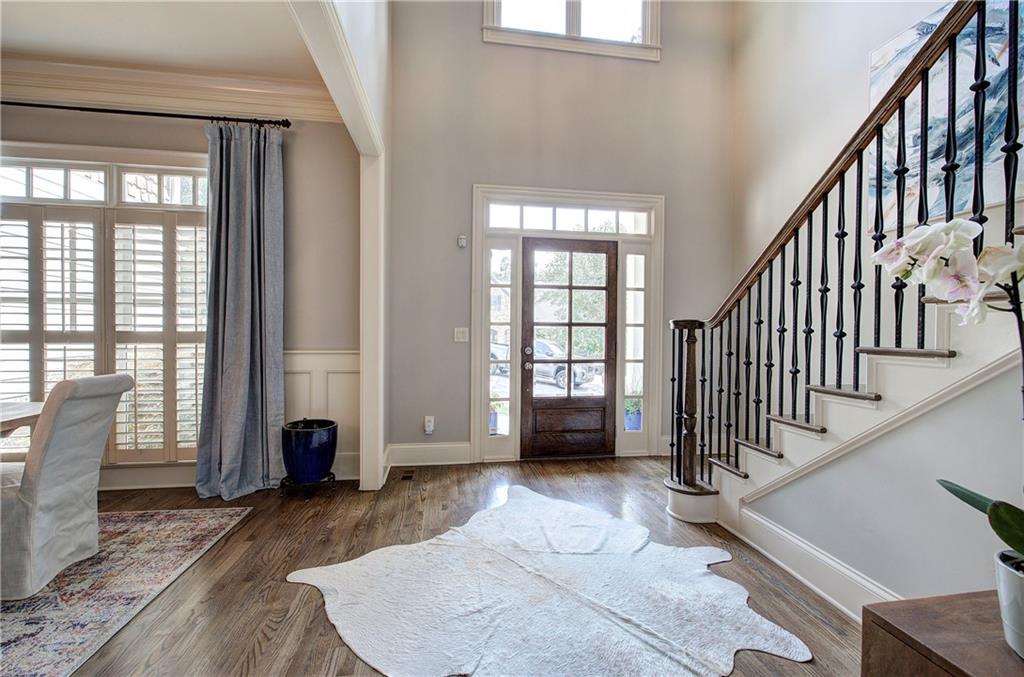 16 Cambridge Way Cartersville, GA 30121 - Photo 4 of 48 a view of an empty room with wooden floor and a window