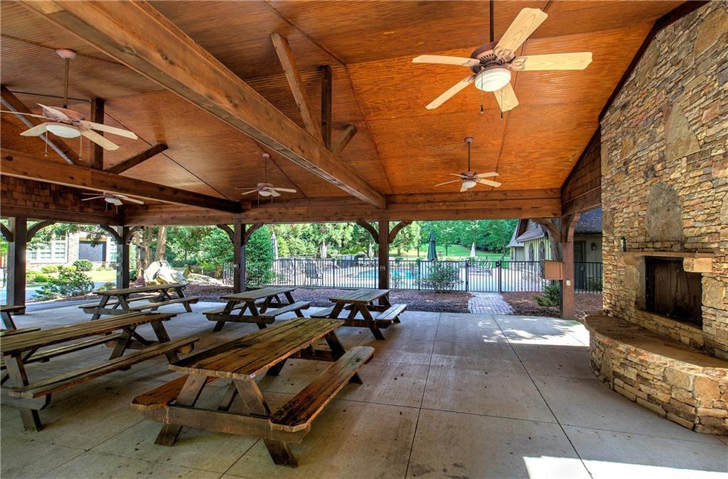 16 Cambridge Way Cartersville, GA 30121 - Photo 45 of 48 a living room with patio furniture and a fireplace