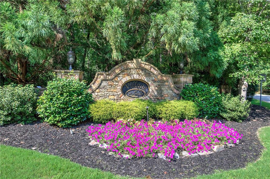 16 Cambridge Way Cartersville, GA 30121 - Photo 48 of 48 a front view of a house with a yard and fountain