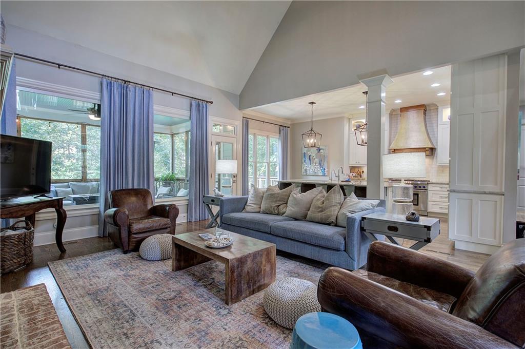 16 Cambridge Way Cartersville, GA 30121 - Photo 6 of 48 a living room with furniture a large window and a flat screen tv