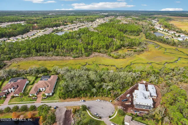 a view of a city with an ocean