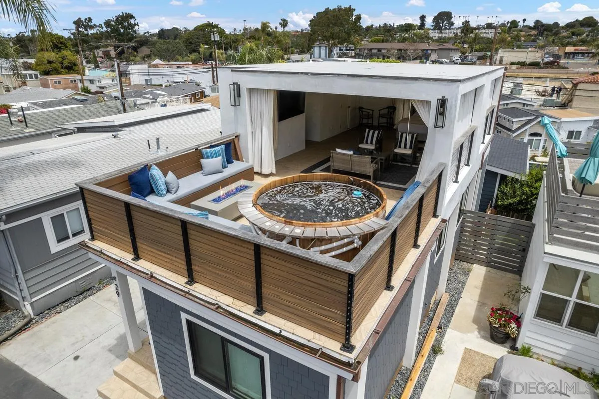 123 Jasper Street, Unit 29 Encinitas, CA 92024 - Photo 18 of 19 a view of a roof deck with wooden floor and barbeque oven