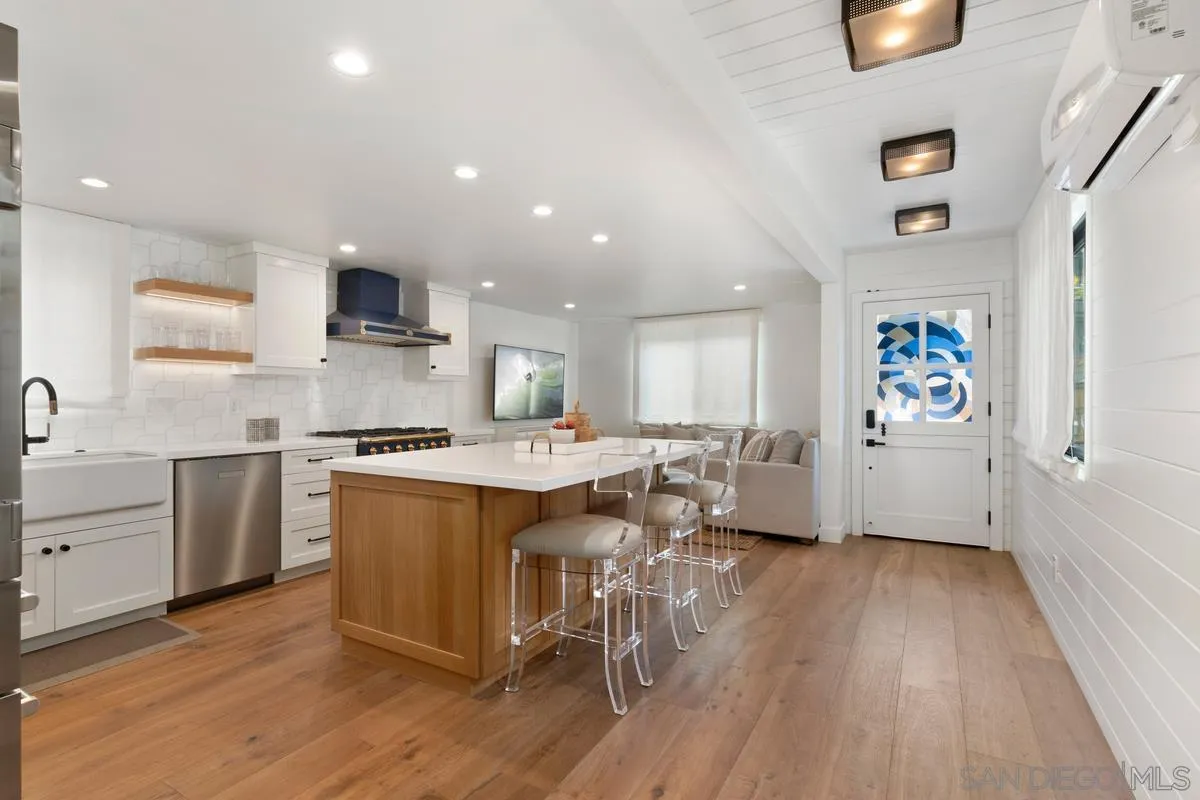 123 Jasper Street, Unit 29 Encinitas, CA 92024 - Photo 5 of 19 a kitchen with a sink appliances and cabinets