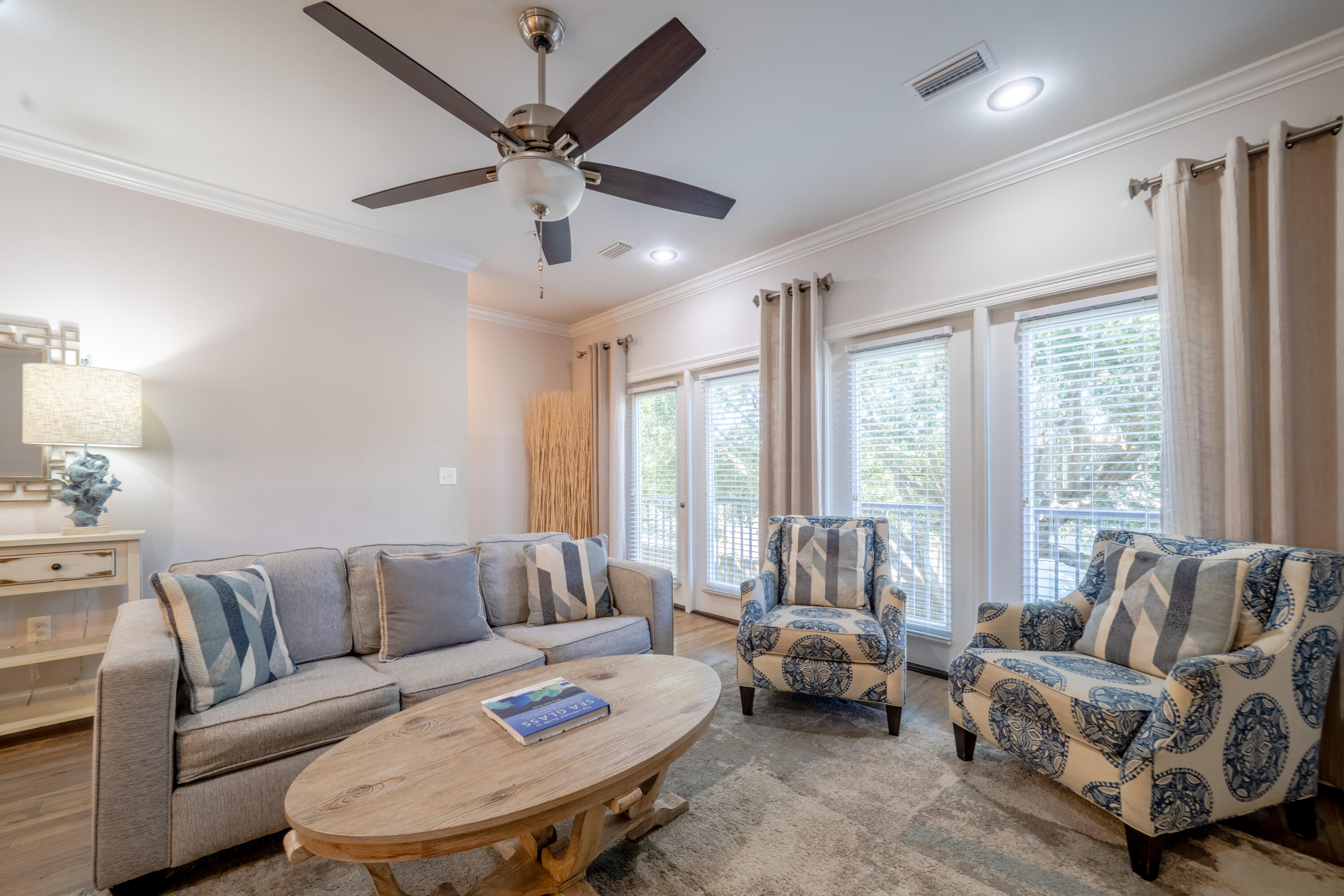 257 Driftwood Road, Unit 2 Miramar Beach, FL 32550 - Photo 11 of 35 a living room with furniture and a large window