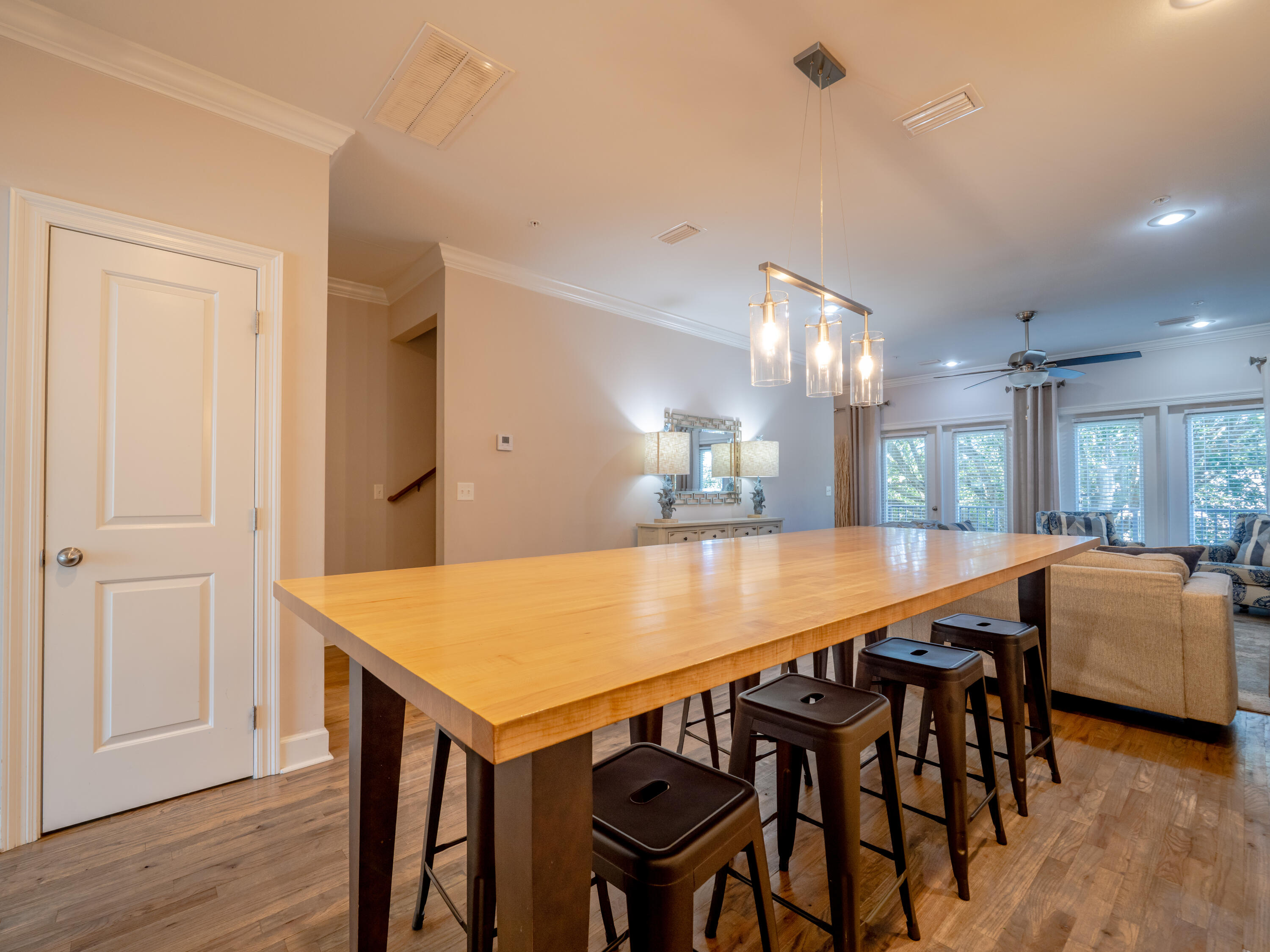 257 Driftwood Road, Unit 2 Miramar Beach, FL 32550 - Photo 17 of 35 a dining room with furniture and wooden floor