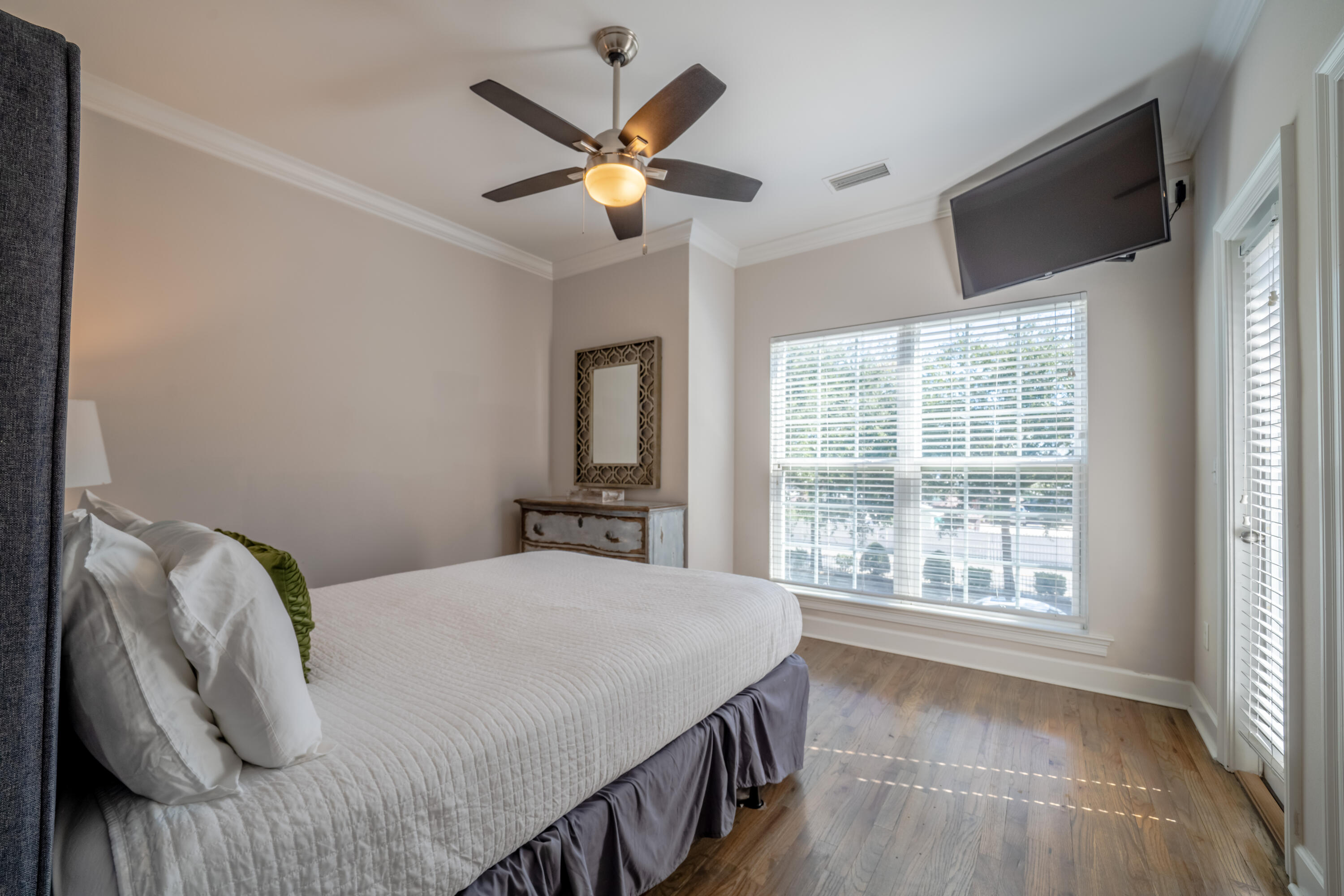 257 Driftwood Road, Unit 2 Miramar Beach, FL 32550 - Photo 18 of 35 a bedroom with a large bed and a large window