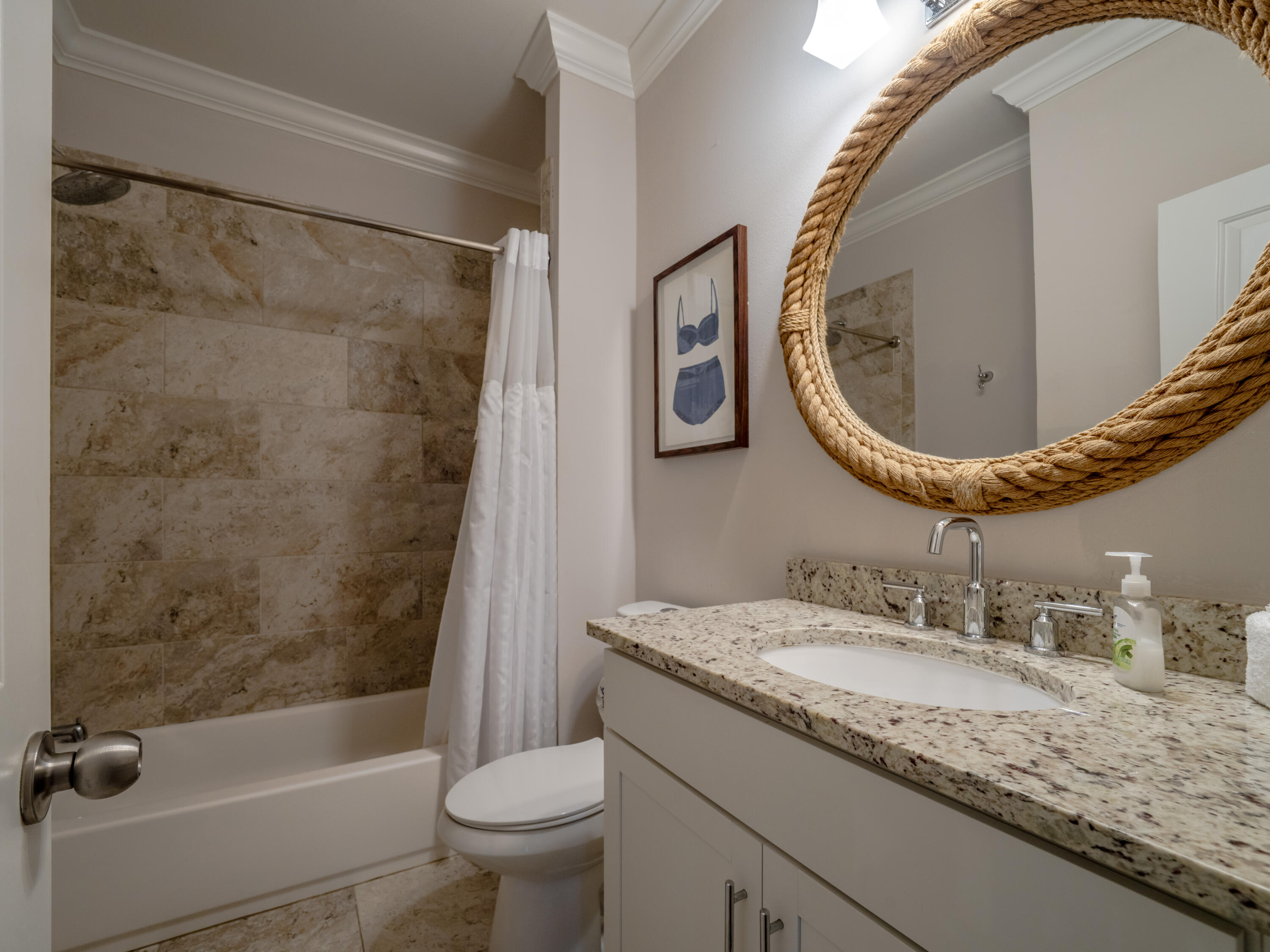 257 Driftwood Road, Unit 2 Miramar Beach, FL 32550 - Photo 22 of 35 a bathroom with a granite countertop sink toilet and shower