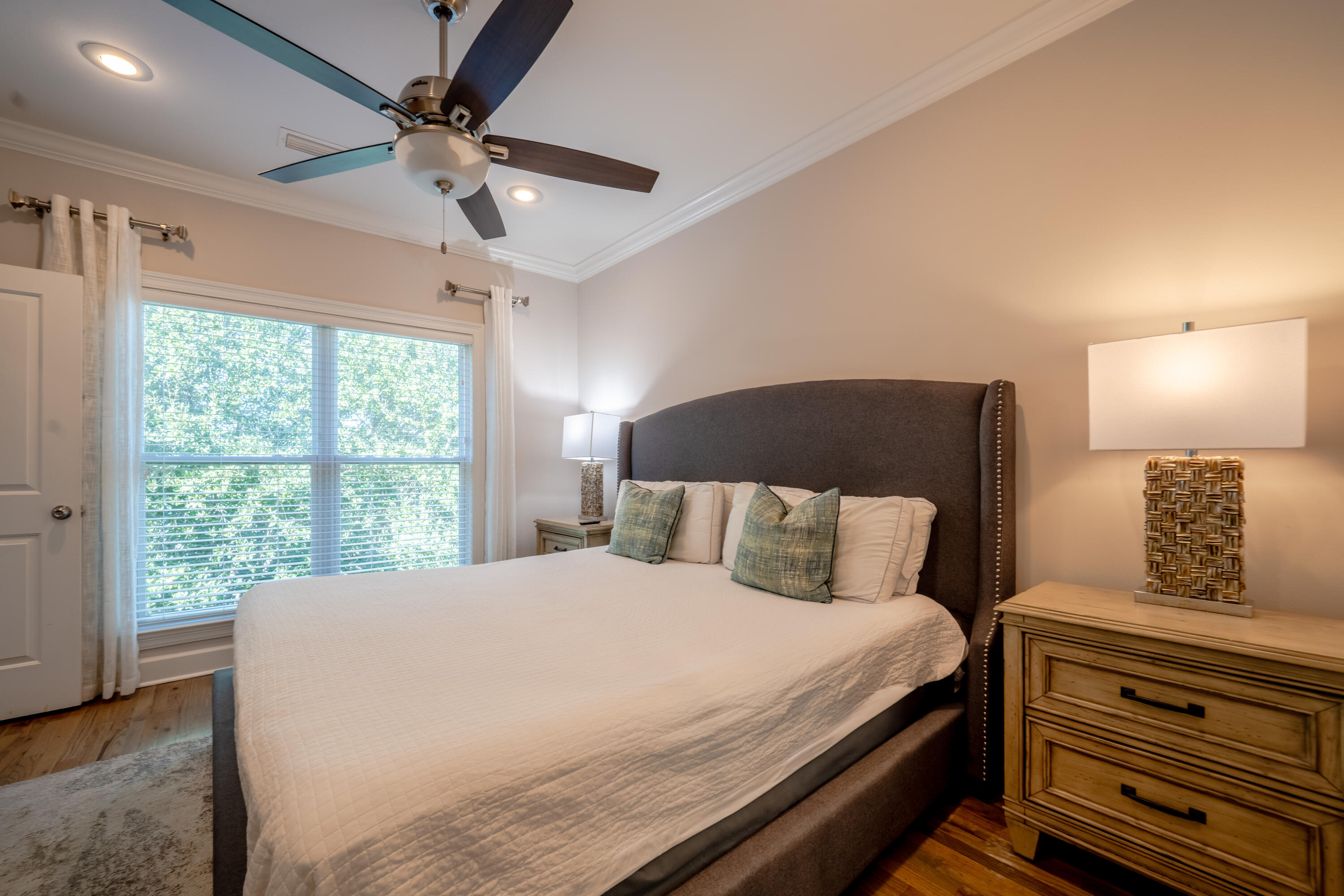 257 Driftwood Road, Unit 2 Miramar Beach, FL 32550 - Photo 24 of 35 a bedroom with a large bed and a window