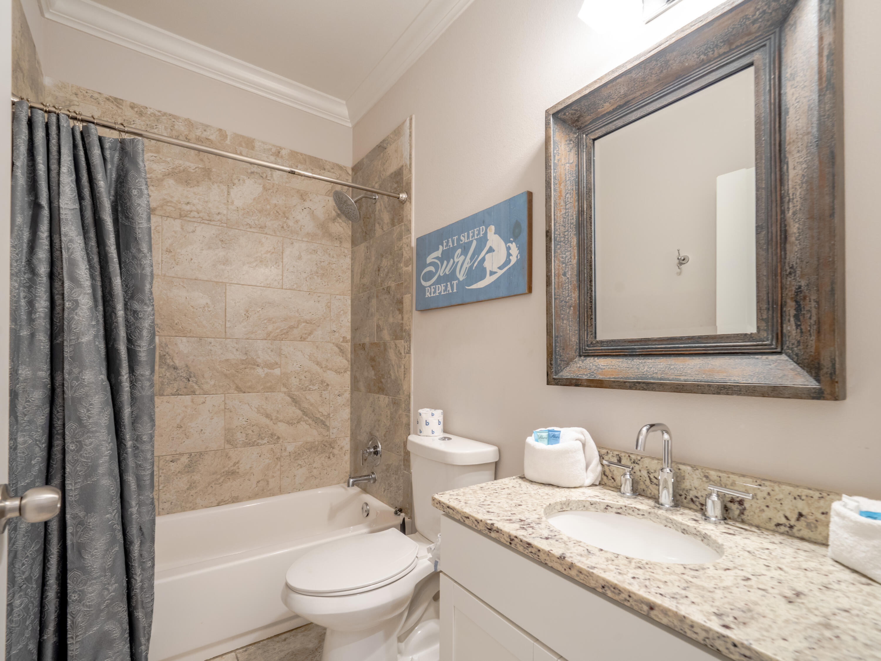 257 Driftwood Road, Unit 2 Miramar Beach, FL 32550 - Photo 7 of 35 a bathroom with a granite countertop sink toilet and shower