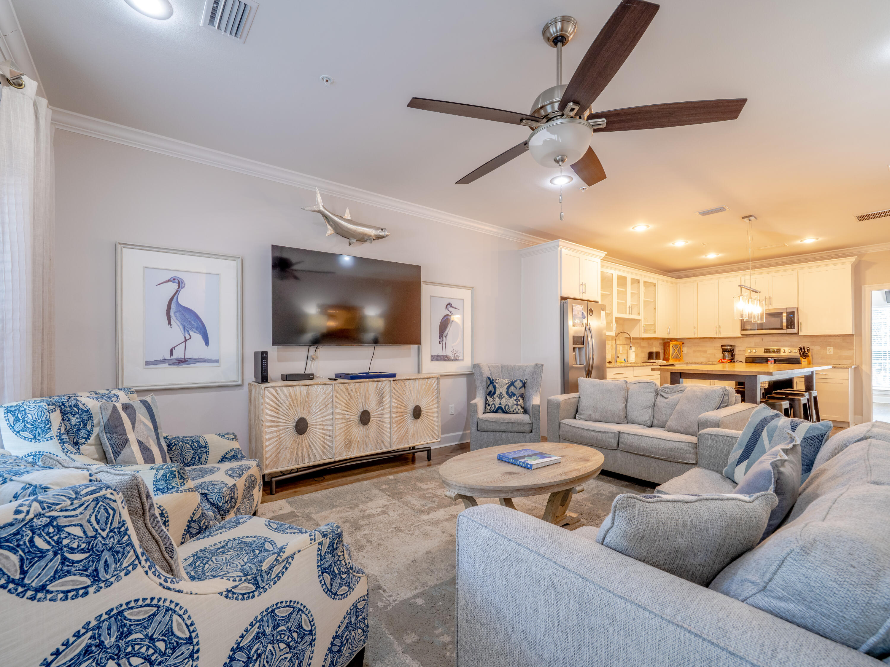 257 Driftwood Road, Unit 2 Miramar Beach, FL 32550 - Photo 9 of 35 a living room with furniture and a flat screen tv