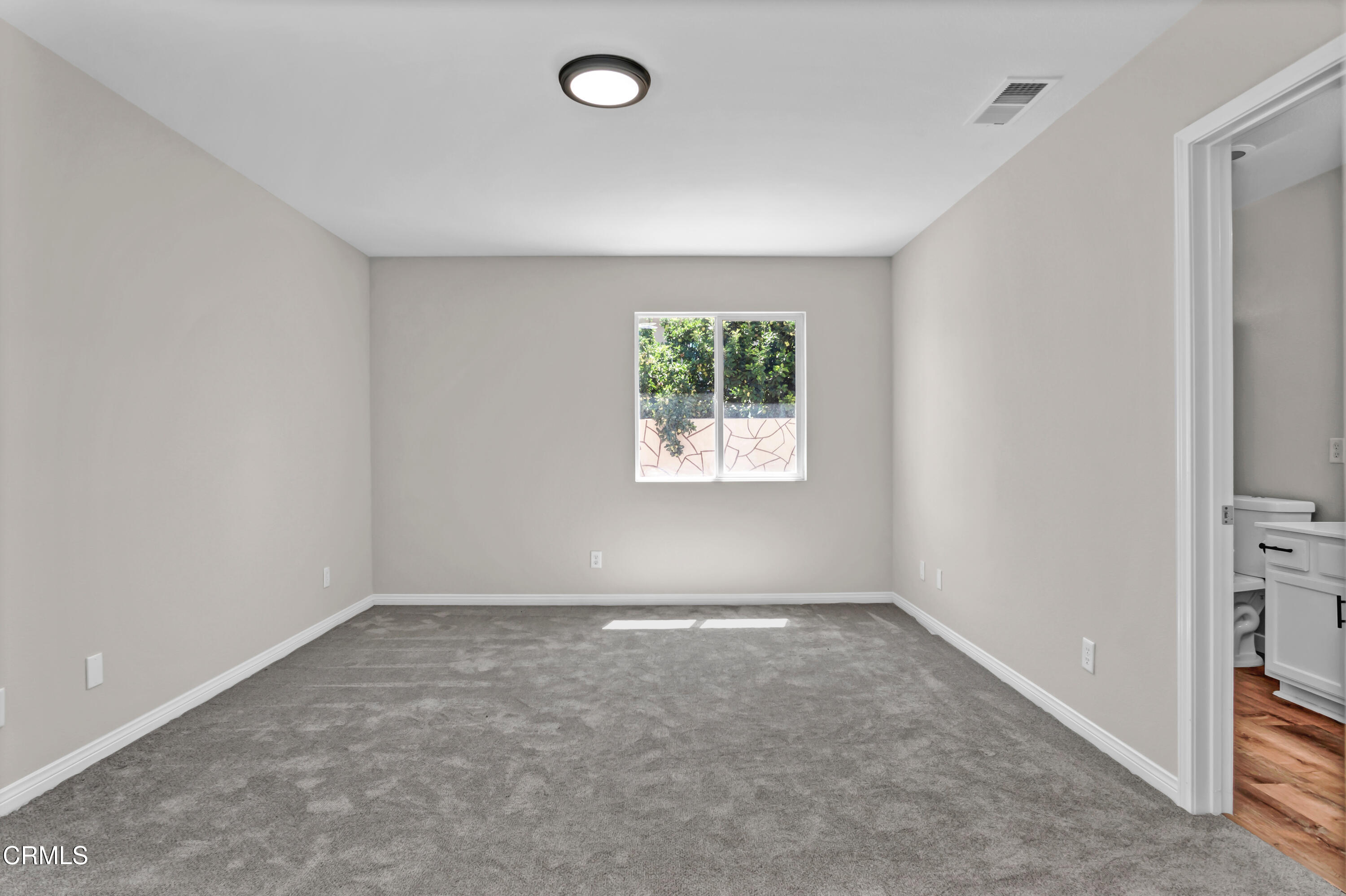 45736 17th Street West Lancaster, CA 93534 - Photo 5 of 6 an empty room with windows