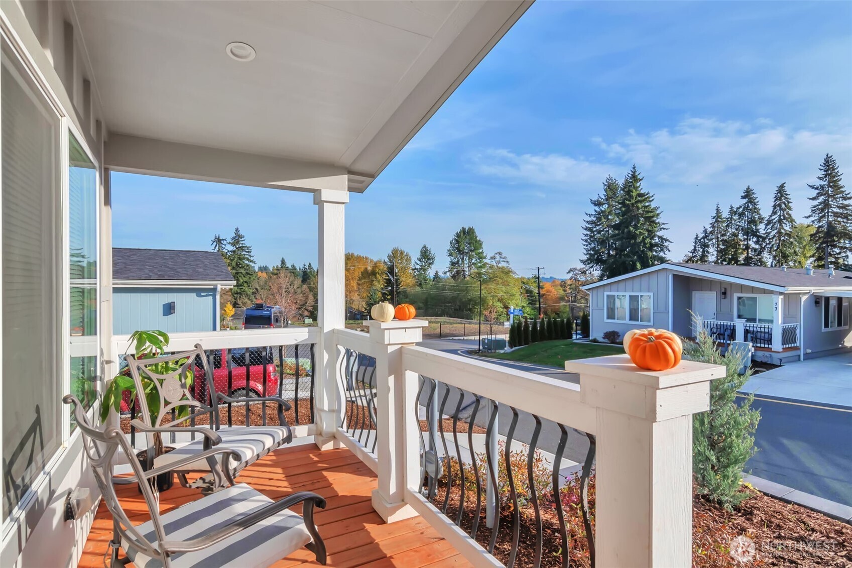 23708 Locust Way, Unit 65 Bothell, WA 98021 - Photo 2 of 32 a view of a chairs and tables in patio