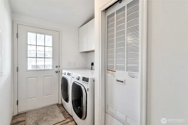 a utility room with dryer and washer