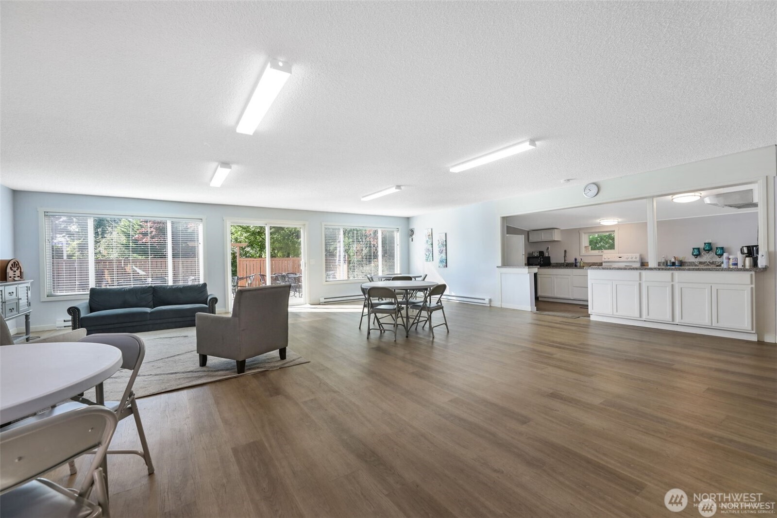 23708 Locust Way, Unit 65 Bothell, WA 98021 - Photo 28 of 32 a living room with furniture and a wooden floor