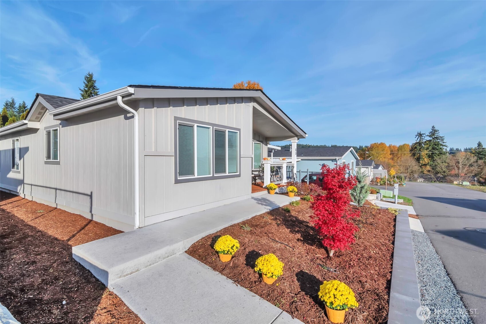 23708 Locust Way, Unit 65 Bothell, WA 98021 - Photo 3 of 32 a view of a house with a backyard