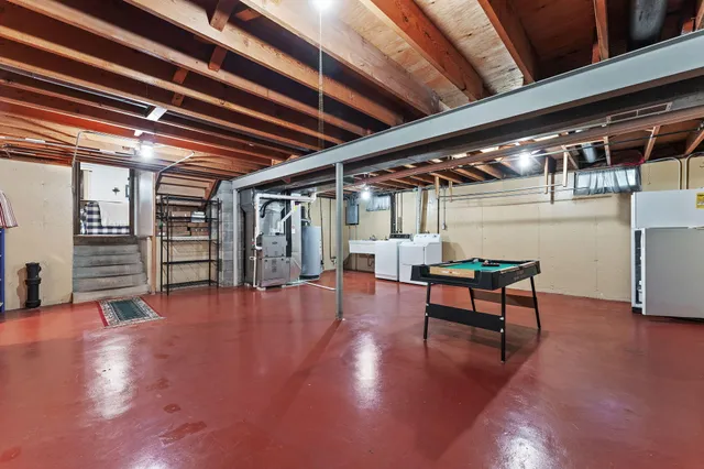 a view of a room with wooden fence and trees