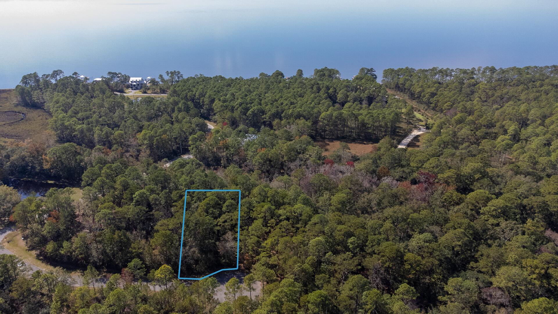 Lot 115 Oak Harbor Freeport, FL 32439 - Photo 2 of 17 an aerial view of a house with a yard