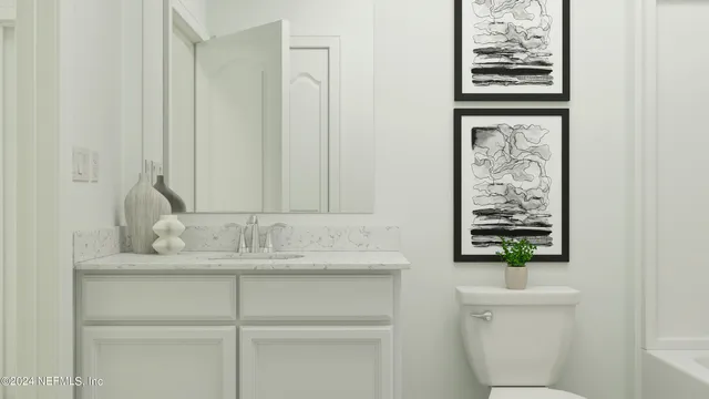 a bedroom with furniture and a large window