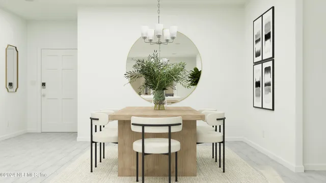 a view of a dining room with furniture and chandelier