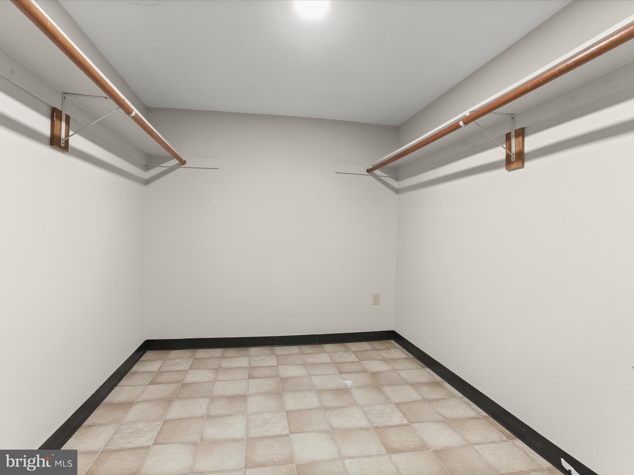 13275 Hunt Ridge Road Ellicott City, MD 21042 - Photo 47 of 62 Large walk-in closet in basement