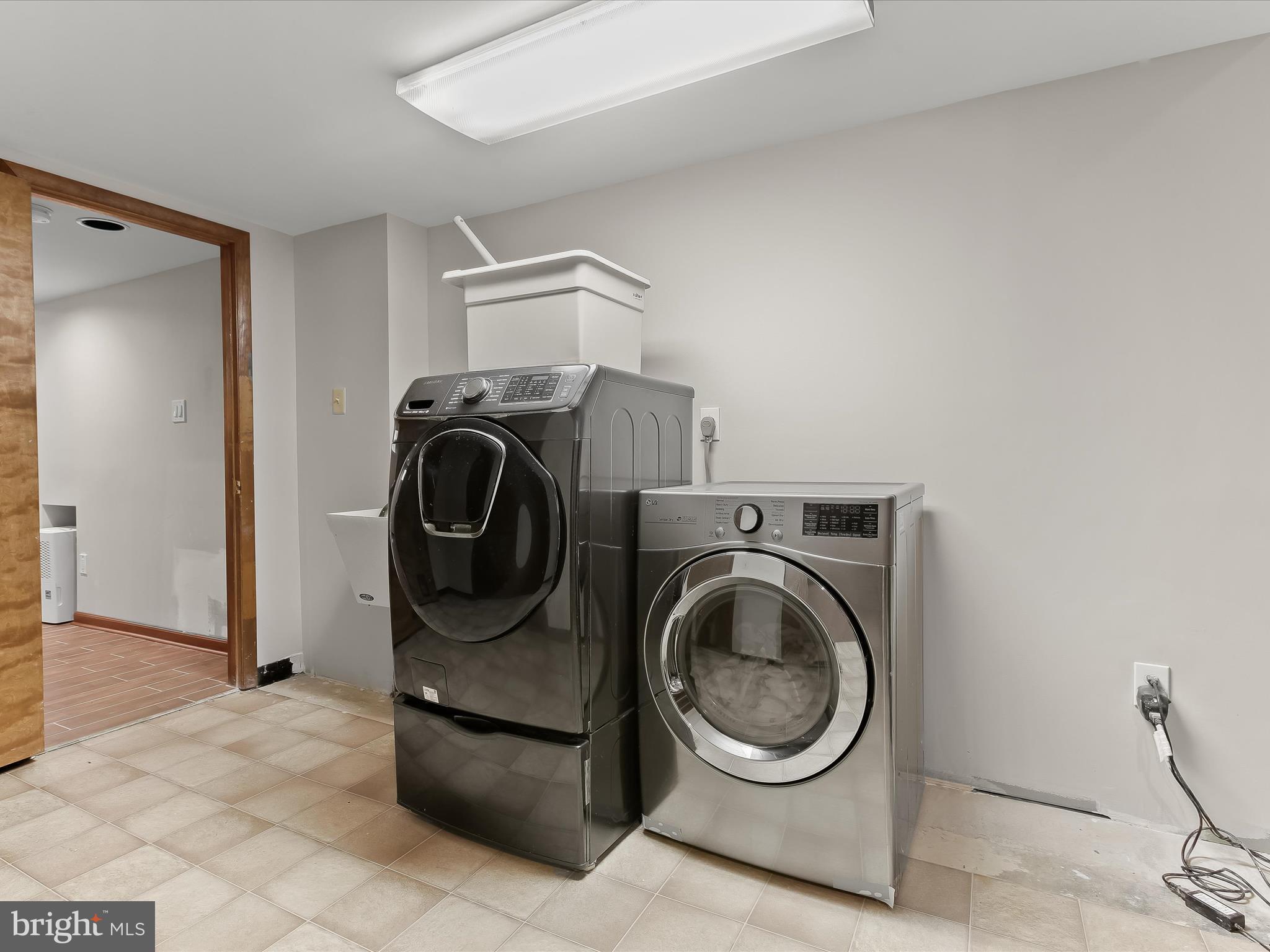 13275 Hunt Ridge Road Ellicott City, MD 21042 - Photo 48 of 62 Laundry in basement