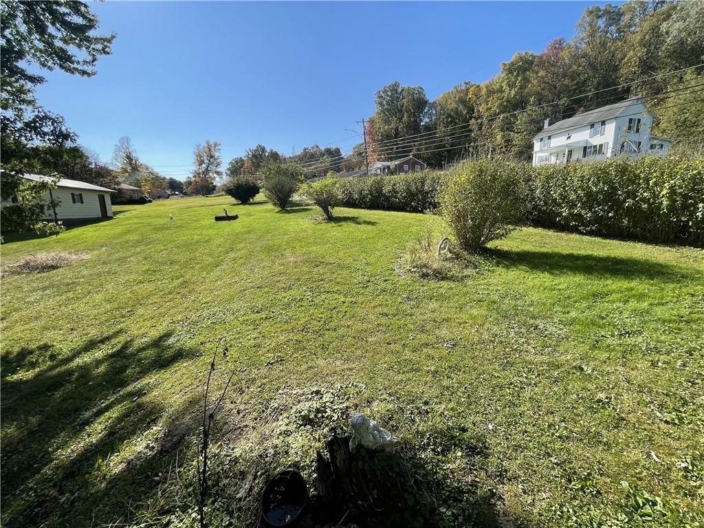 466 Old Rte 51 Smock, PA 15480 - Photo 3 of 18 a view of a garden with houses