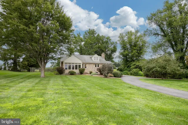 a view of a house with a big yard