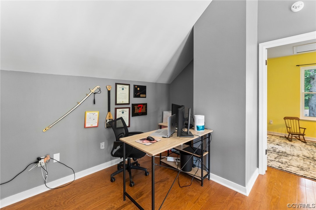 10706 Genlou Road Chesterfield, VA 23832 - Photo 24 of 34 a view of a workspace with furniture and a window